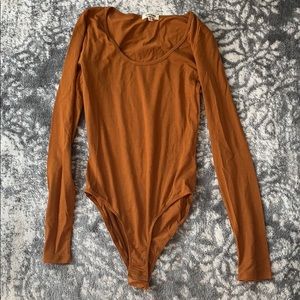 Orange bodysuit
